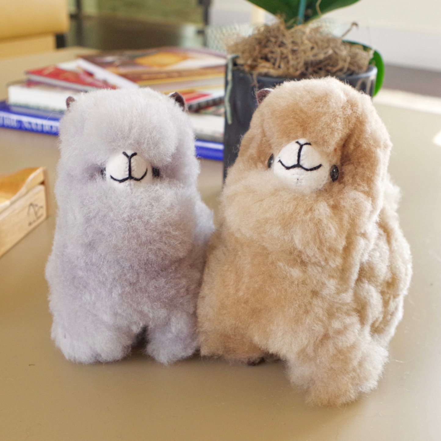 Home decor or gift soft fluffy llama plushies. 100% alpaca wool plushies. Made by Bolivian and Peruvian artisans. Chibi cute llama toy