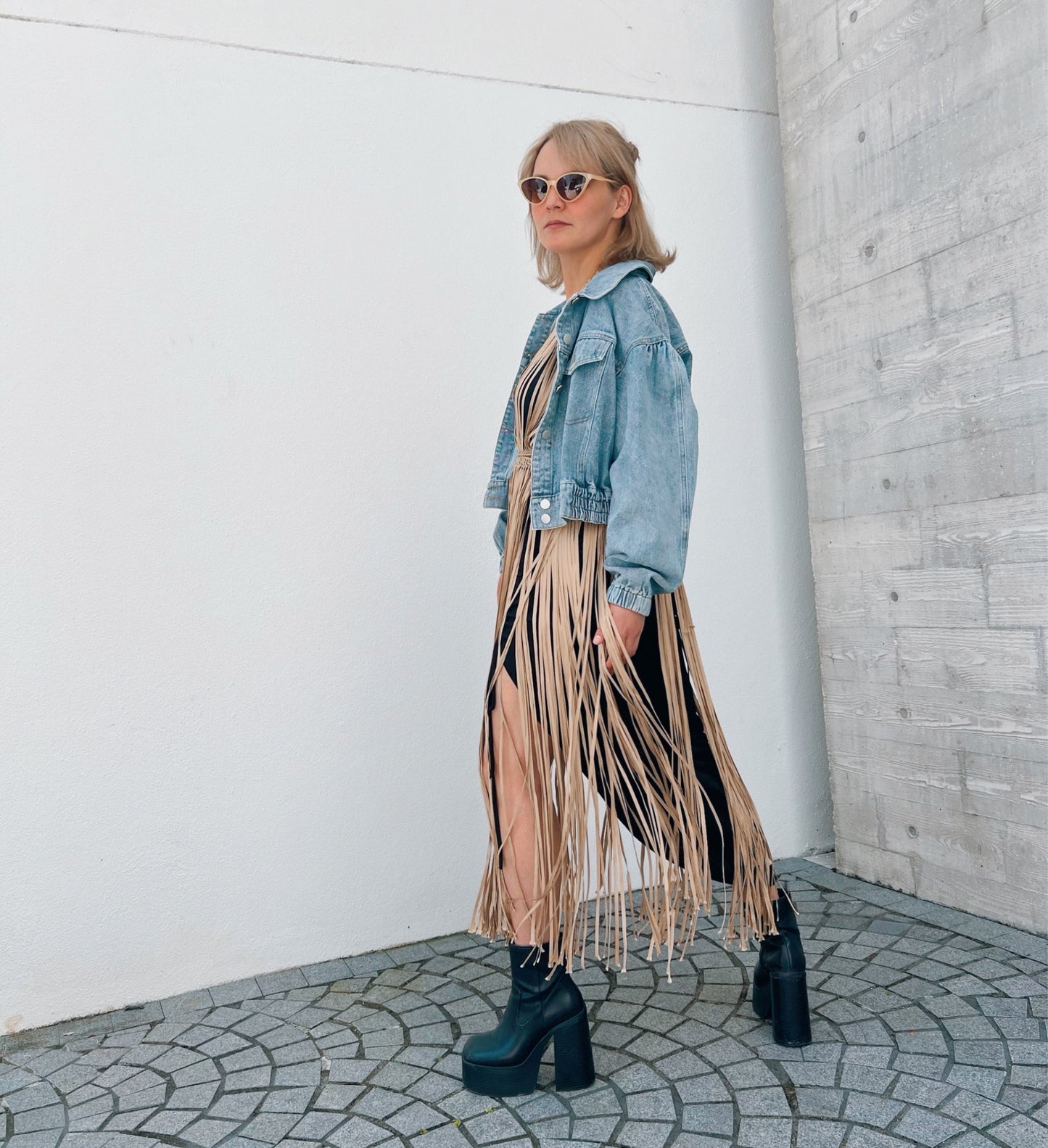 Gold macrame accesory for festival or beach vacation. Wrap tie closure at shoulders and waist. Care instructions: Steam to straighten any wrinkles. Ethically made by Bolivian Artisans. 100% Rayon. Colors available: Beige, Black, Gold.