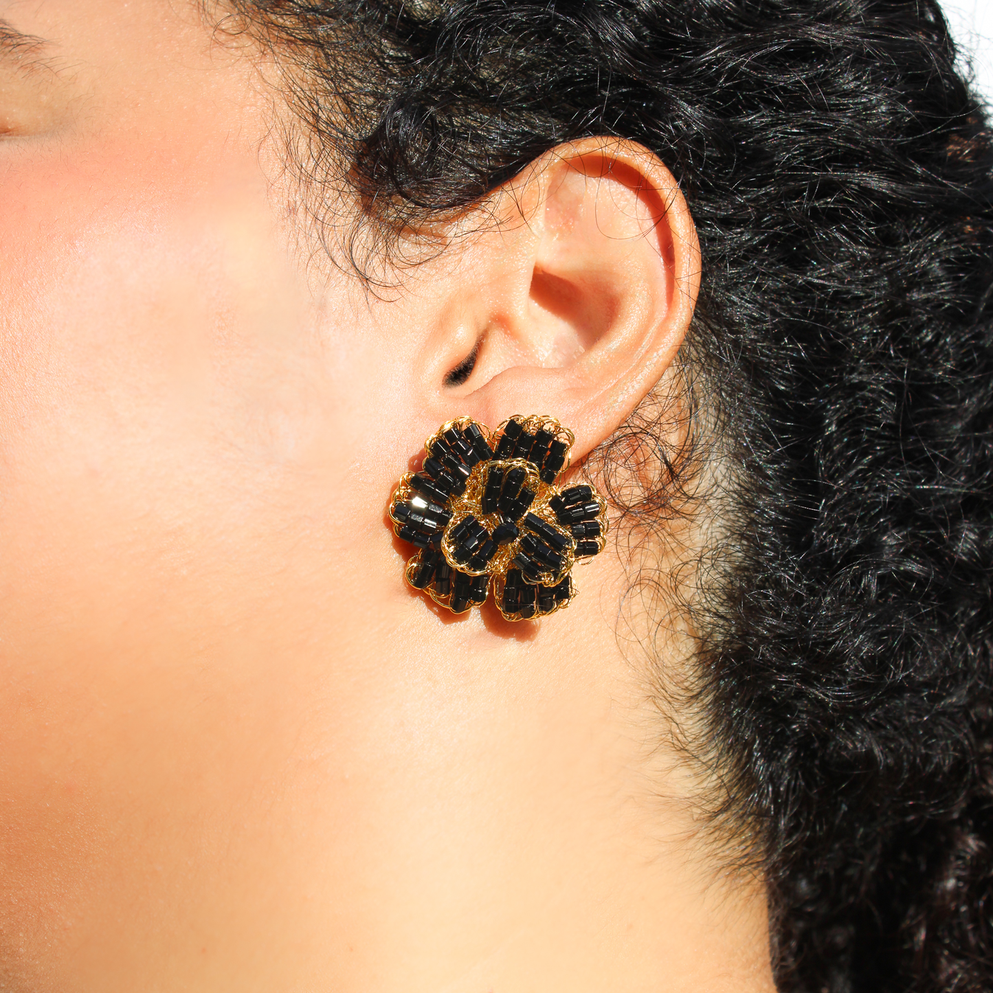 Handmade crochet multilayered earrings. Gold wire and black shiny beads. flower inspired shaped earrings for her. Post and clip elegant earrings