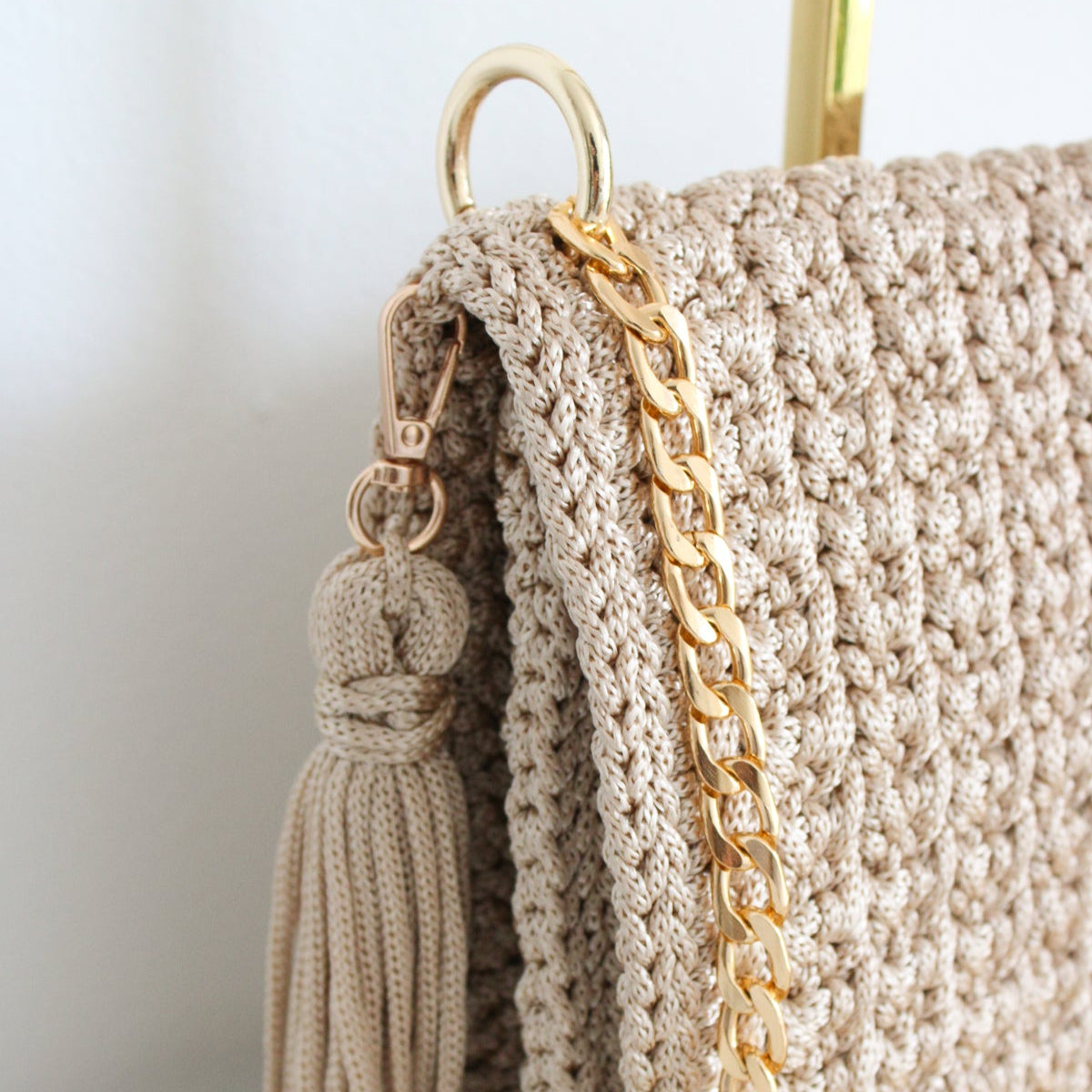 Handmade crochet bag. artisan made stylish crochet bag for her. Magnetic closure and gold chains for crossbody or shoulder looks.