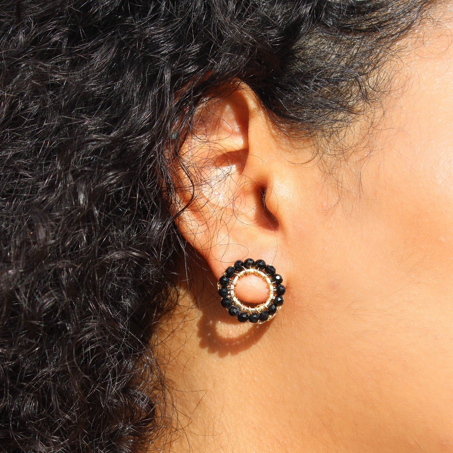 Small circle crochet handmade earrings. 18 karat gold filled copper wire. Lightweight and delicate with black beads