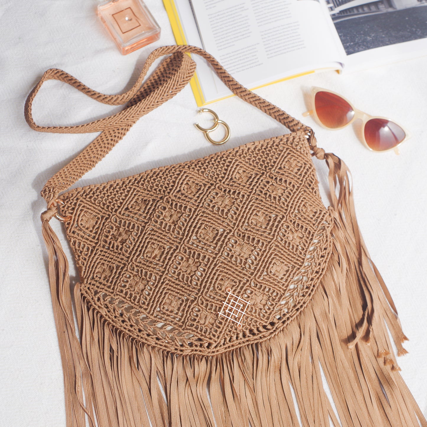 Boho macrame bag with fringes. Spacious handmade Travel bag perfect for festivals