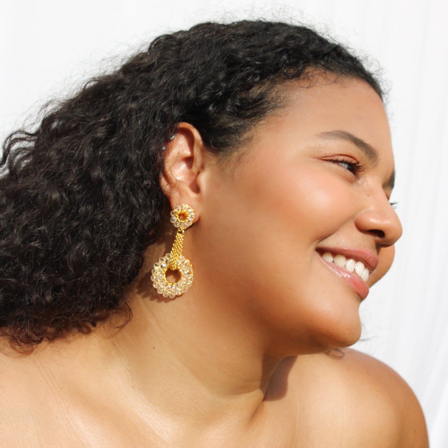 Lightweight crochet dangles with clear quartz. Handmade crochet beaded earrings - 18 karat gold filled copper wire and create a statement look without the weight or bulk! versatile accessories