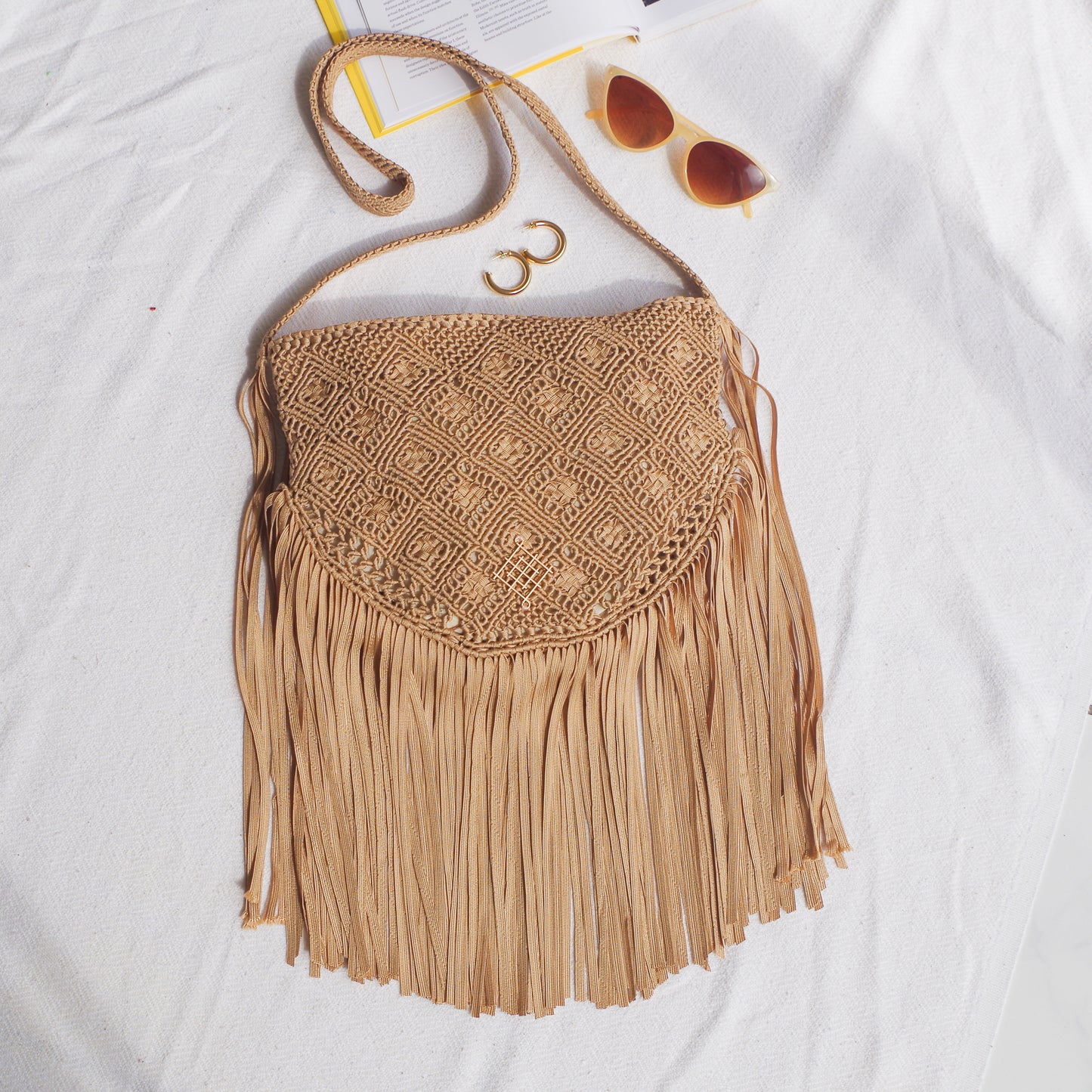 Boho macrame bag with fringes. Spacious handmade Travel bag perfect for festivals