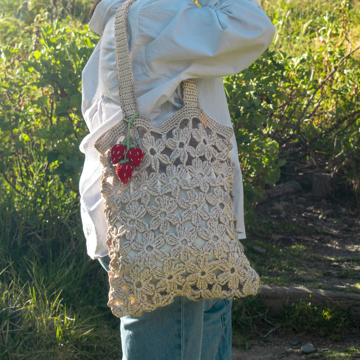 Handmade crochet flower tote bag in beige. This handmade tote bag features soft interior lining and pocket. each bag has over 40 crochet flowers and has lots of space to fit your stuff, like phone, wallet, glasses, make up bag, hat, etc. Perfect classy handmade tote bag in beige