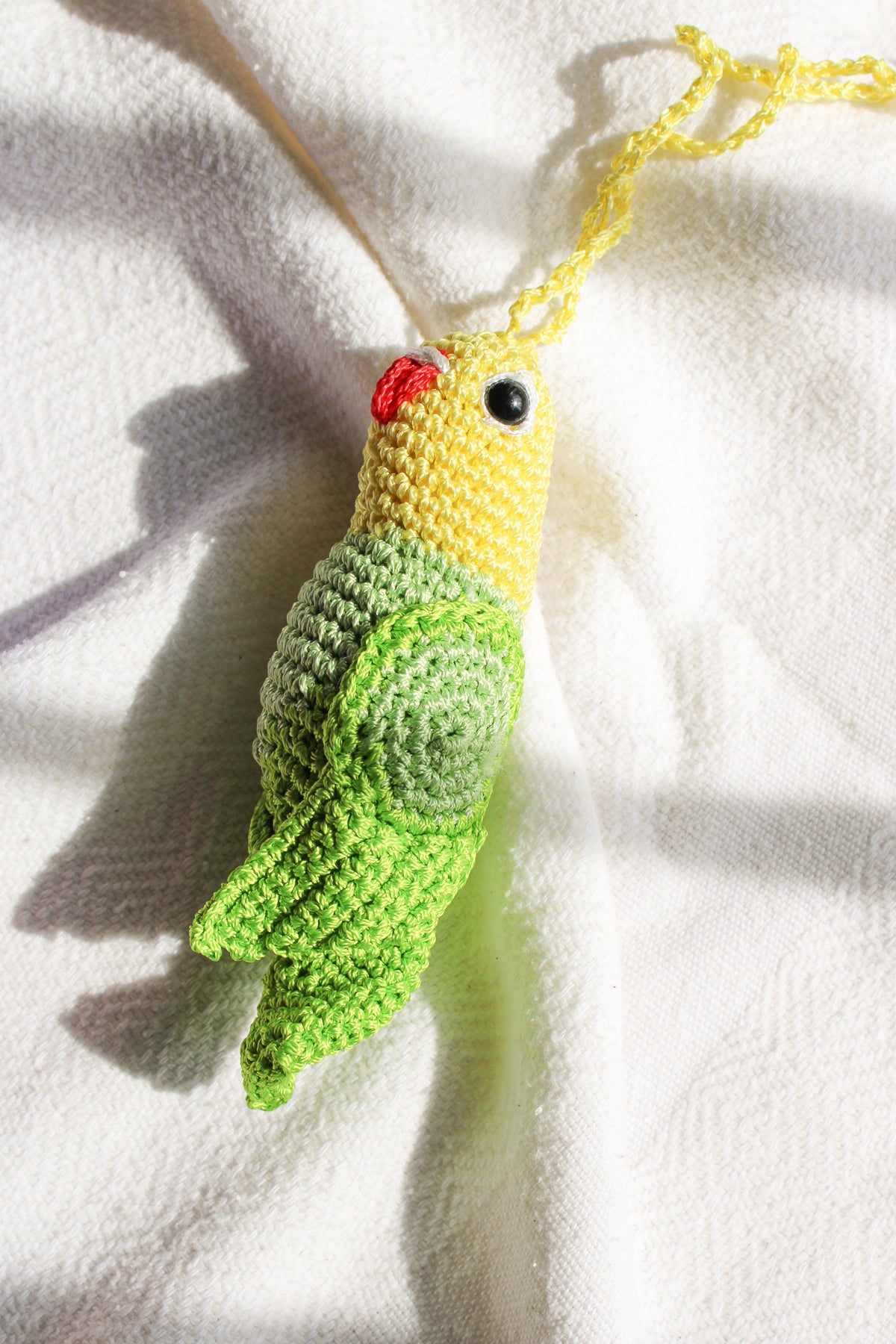 Handmade crochet green parrot bag charm. Add a pop of bright color and fun style to your purses or backpacks.
Handmade bright amigurumi bird. decoration for purse, bag or backpack. Perfect gift for friends and family. Add a pop of color and personality to your bags. Animal bag charms