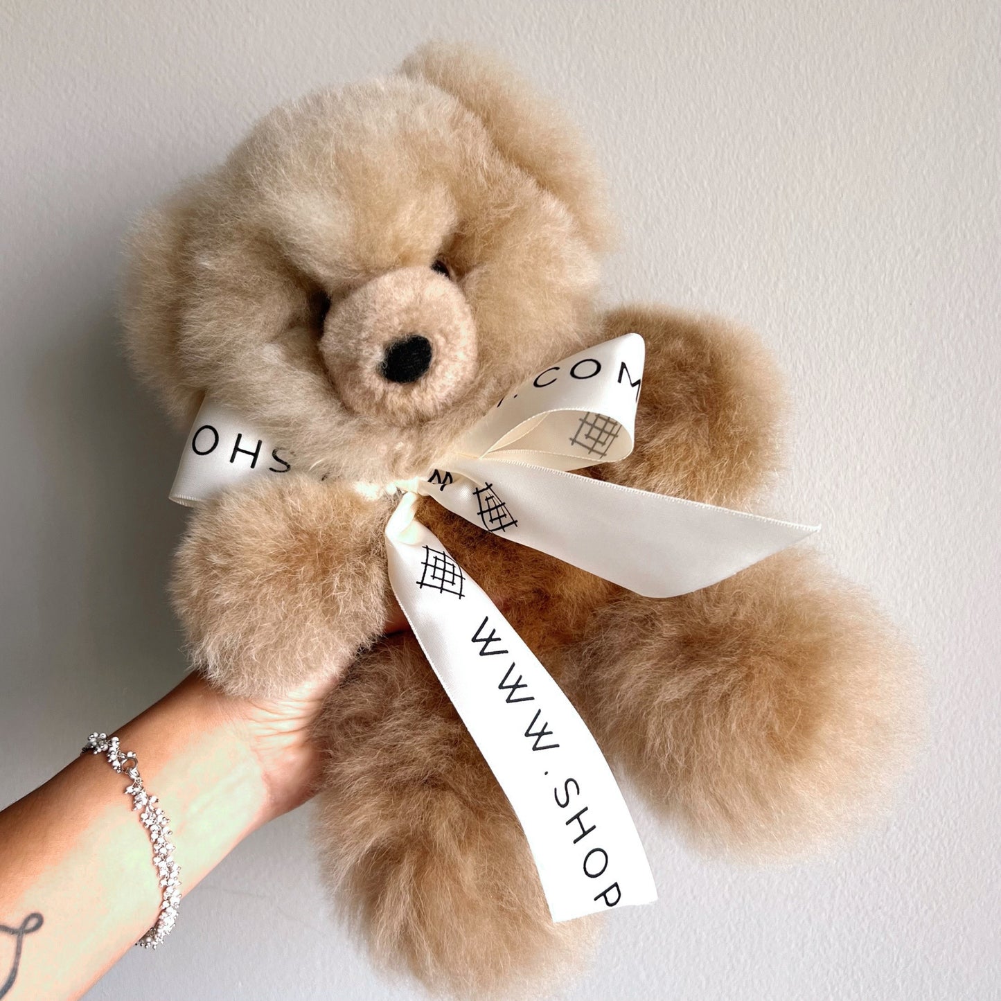 Handmade alpaca wool plushie.  12