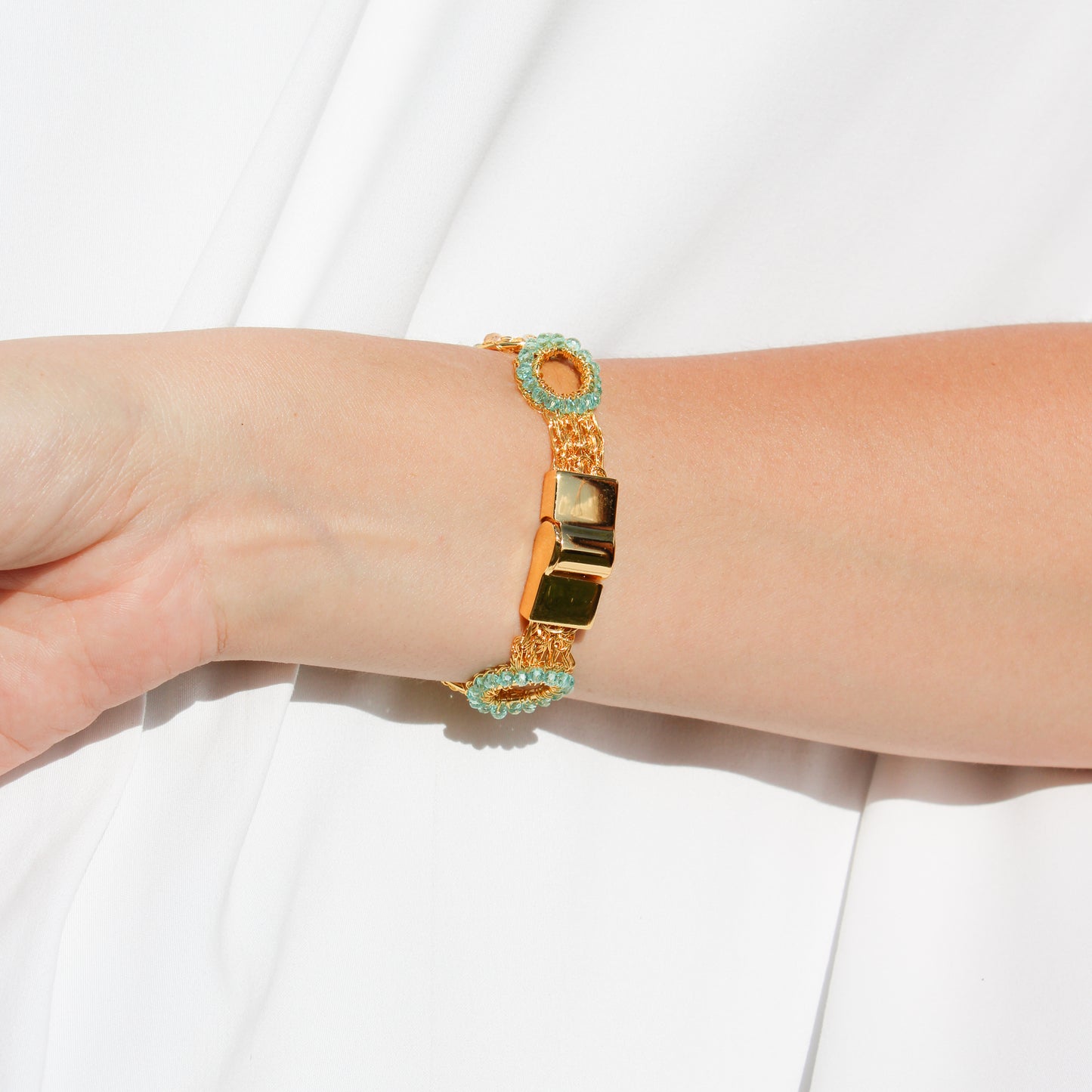 This unique handmade gold bracelet is the perfect way to add a pop of shimmer to your outfits. With pearls, crystal beads and gold wire. Multilayered handmade beautiful bracelet for woman with magnetic closure