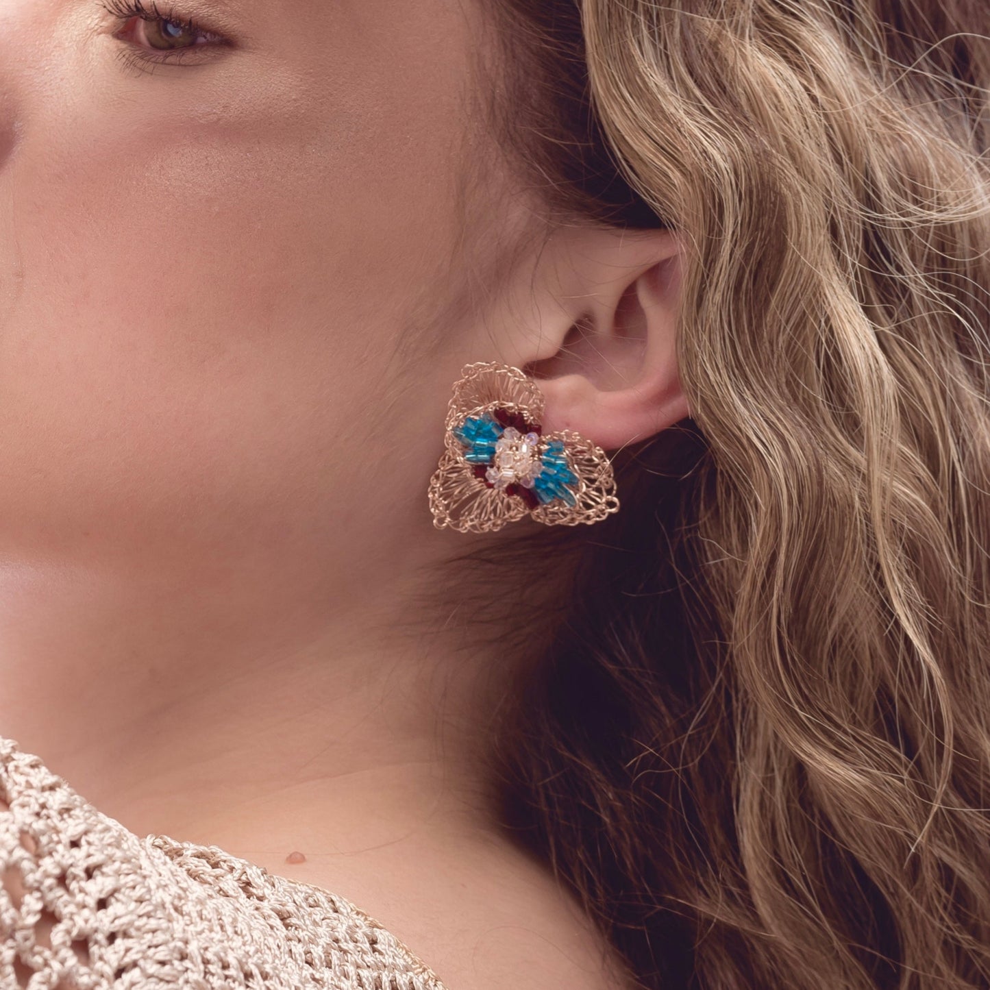 Handmade crochet rose gold earrings with blue and red beads