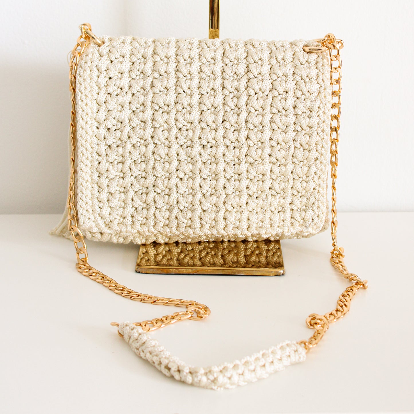 Handmade crochet bag. artisan made stylish crochet bag for her. Magnetic closure and gold chains for crossbody or shoulder looks.