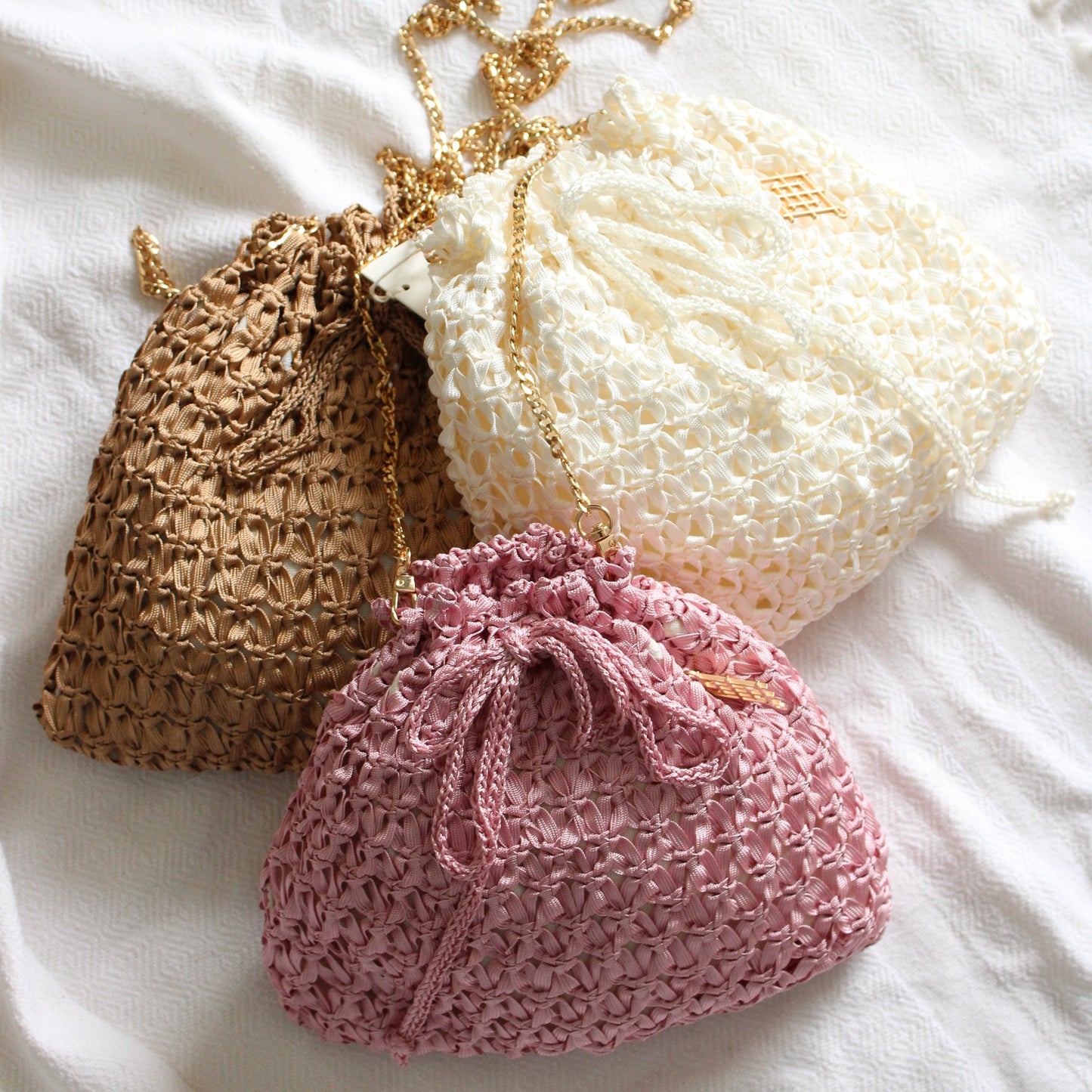 Handmade purse. Crochet strap, Fully lined, includes pockets. Drawstring crochet bag perfect for traveling.