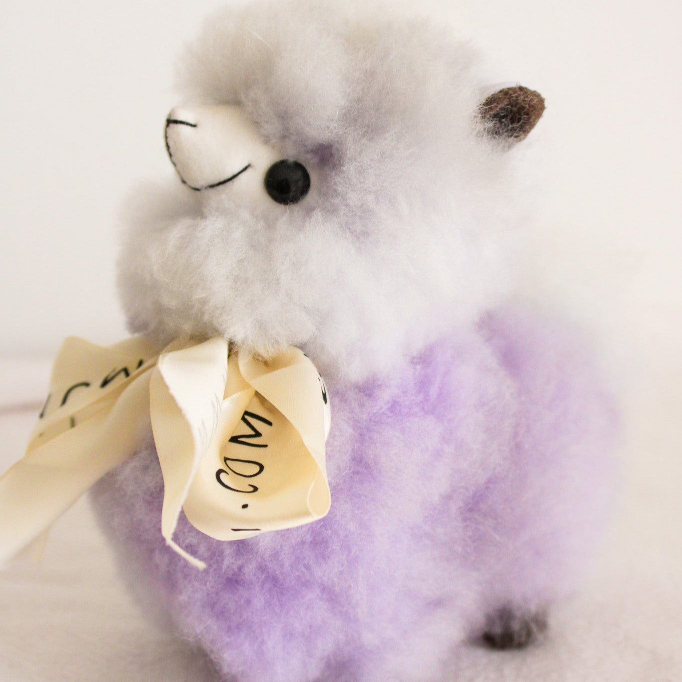 Home decor or gift soft beige llama plushies. 100% alpaca wool plushies. Made by Bolivian and Peruvian artisans. Chibi cute super fluffy pink llama toy