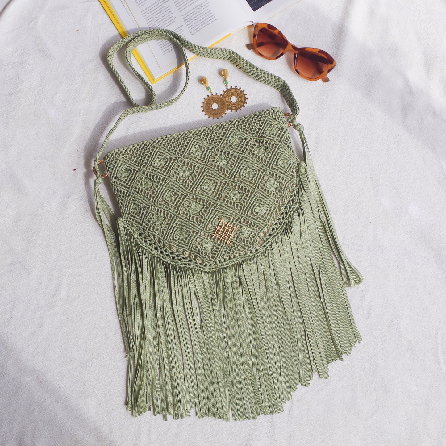 Boho macrame bag with fringes. Spacious handmade Travel bag perfect for festivals