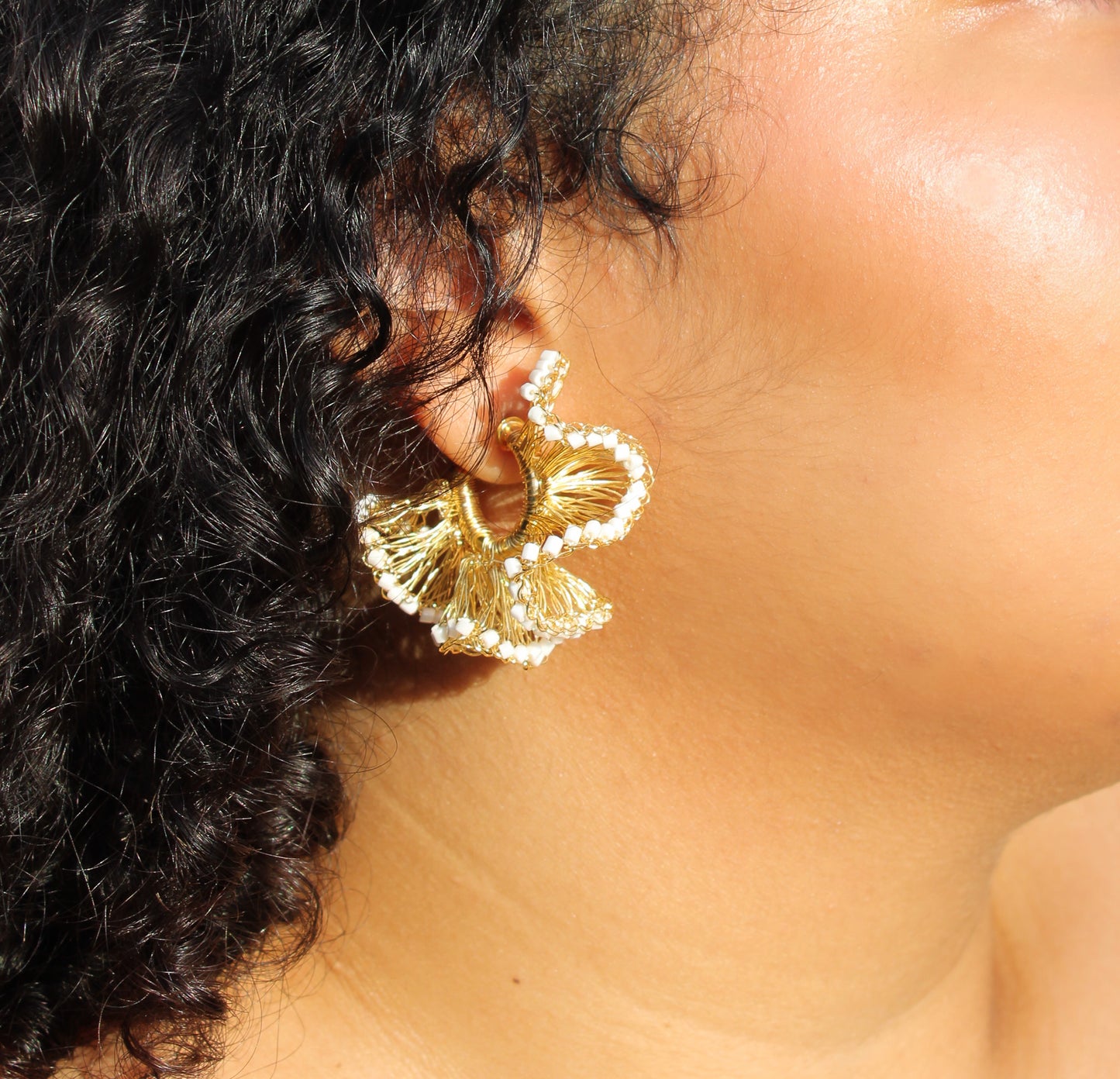 Lightweight ruffled crochet hoops, white beads and 18 karat gold filled copper wire and create a statement look without the weight or bulk!