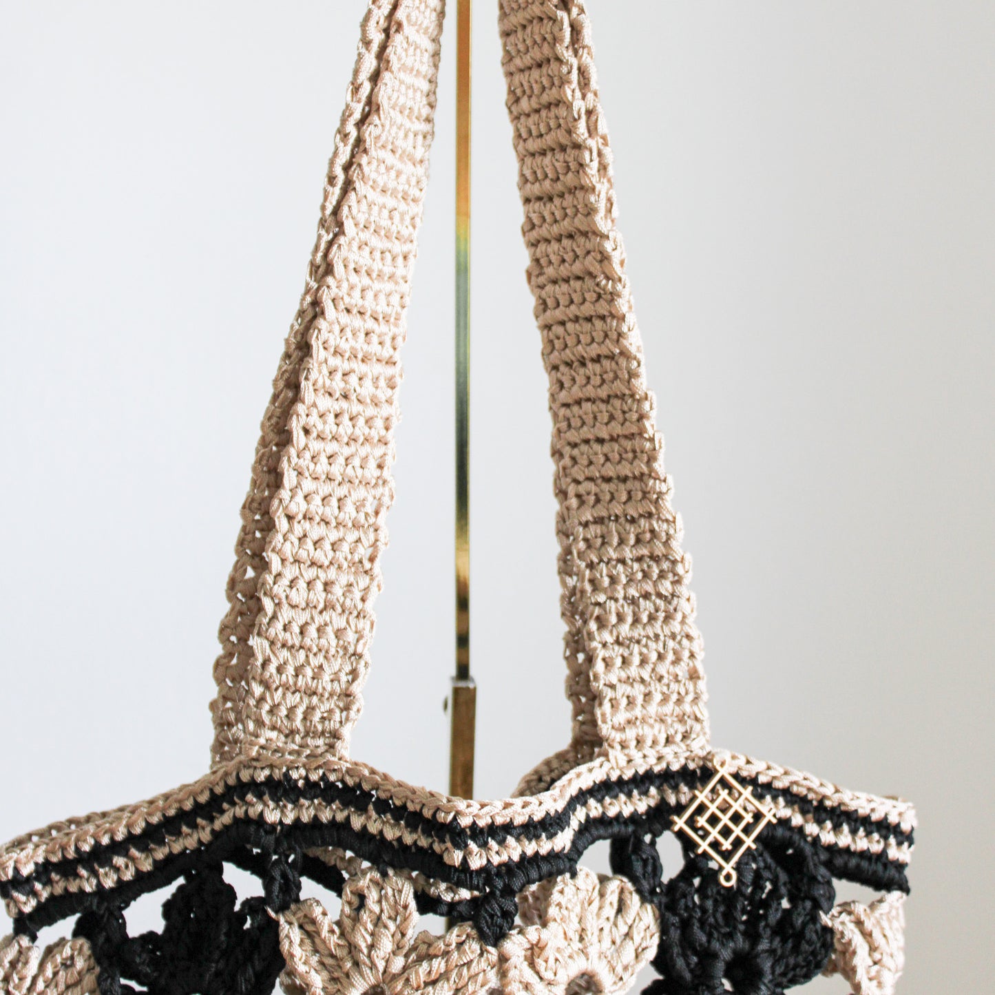 Handmade crochet flower tote bag in beige. This handmade tote bag features soft interior lining and pocket. each bag has over 40 crochet flowers and has lots of space to fit your stuff, like phone, wallet, glasses, make up bag, hat, etc. Perfect classy handmade tote bag in beige