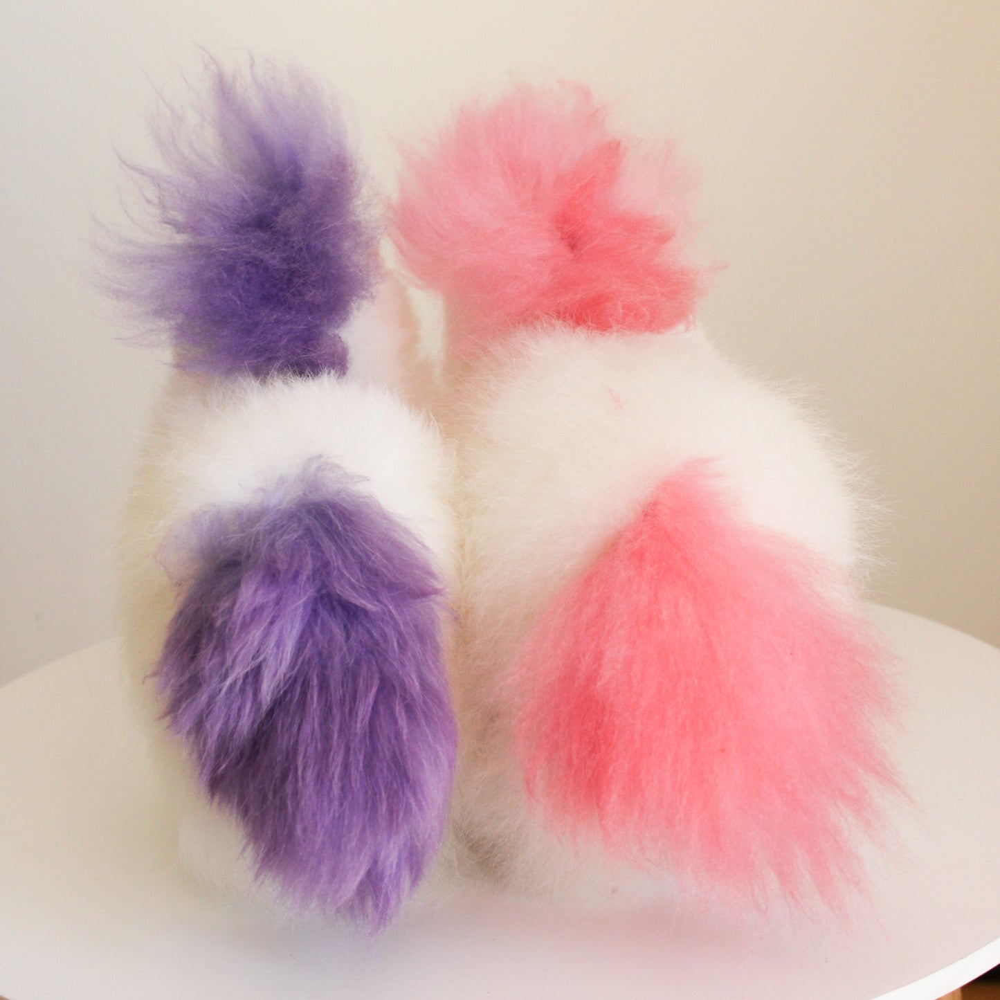 Alpaca wool unicorn plushie gift or home decoration. 100% baby  
alpaca wool. Handmade by Bolivian and Peruvian artisans. Pink & purple stuffed unicorn