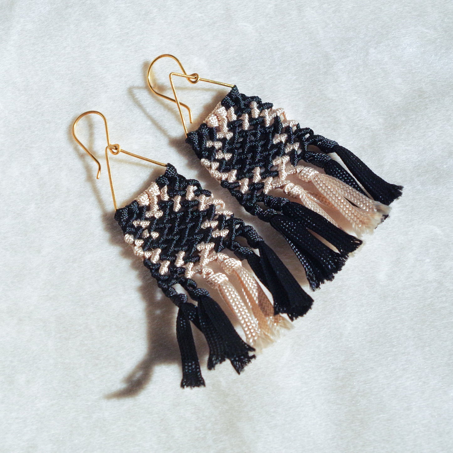 Macrame earrings with fringe. Gold plated hook earrings won’t cause any allergies nor rust with time. Black and beige macrame earrings