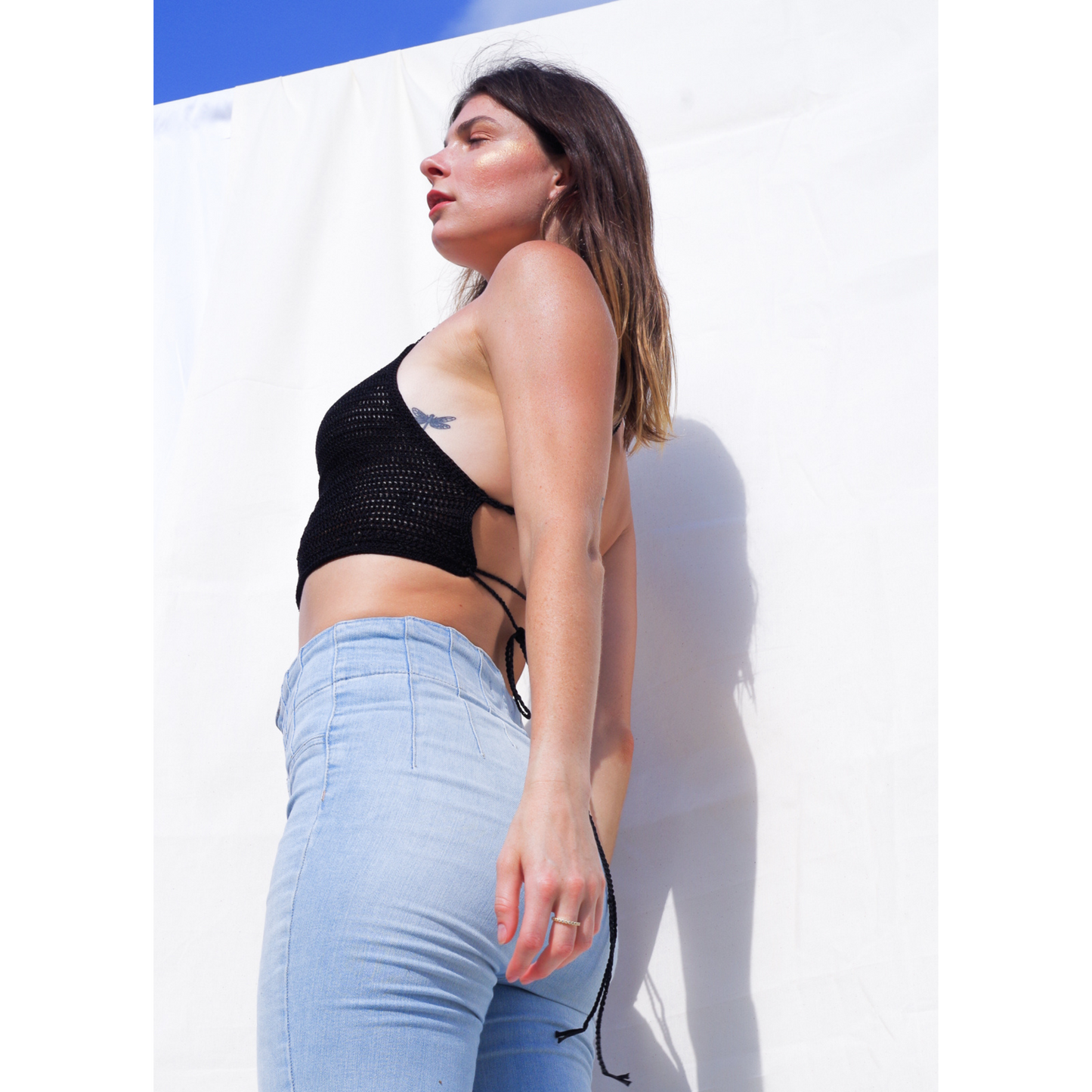 Crop top with spaghetti straps and an open back. Hand made with our signature silk ribbons. One size fits S - L