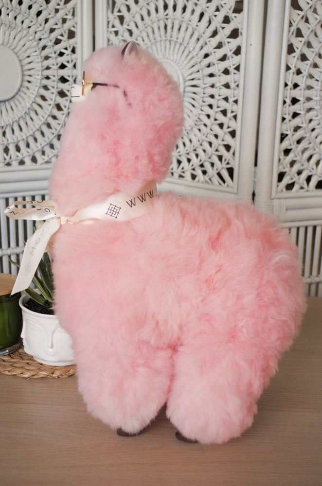 Alpaca wool plushie for home decor or gift. Large size 20" in. Made with 100% alpaca wool. Madeby bolivia and Peruvian artisans. Colors Available: pink, white, beige, gray, lilac. Adult or children gift