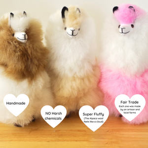 
            
                Load image into Gallery viewer, Llama plushie for home decor or gift. Medium size 12&amp;quot; in. Made with 100% alpaca wool. Made by Bolivian and Peruvian artisans. Colors Available: pink, white, beige, purple. Adult or children gift
            
        
