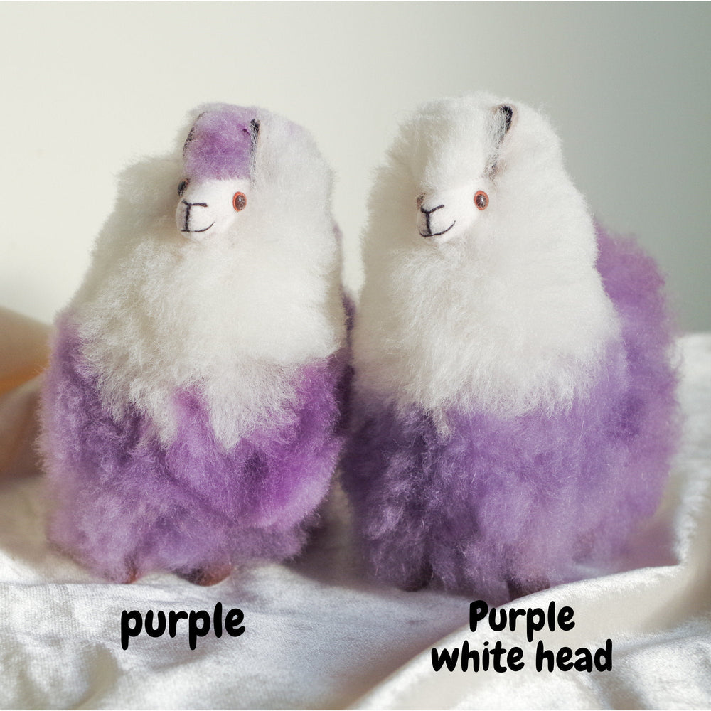 Alpaca wool plushie for home decor or gift. Small size 6" in. Made with 100% alpaca wool. Made by Bolivian and Peruvian artisans. Colors Available: purple. Adult or children gift