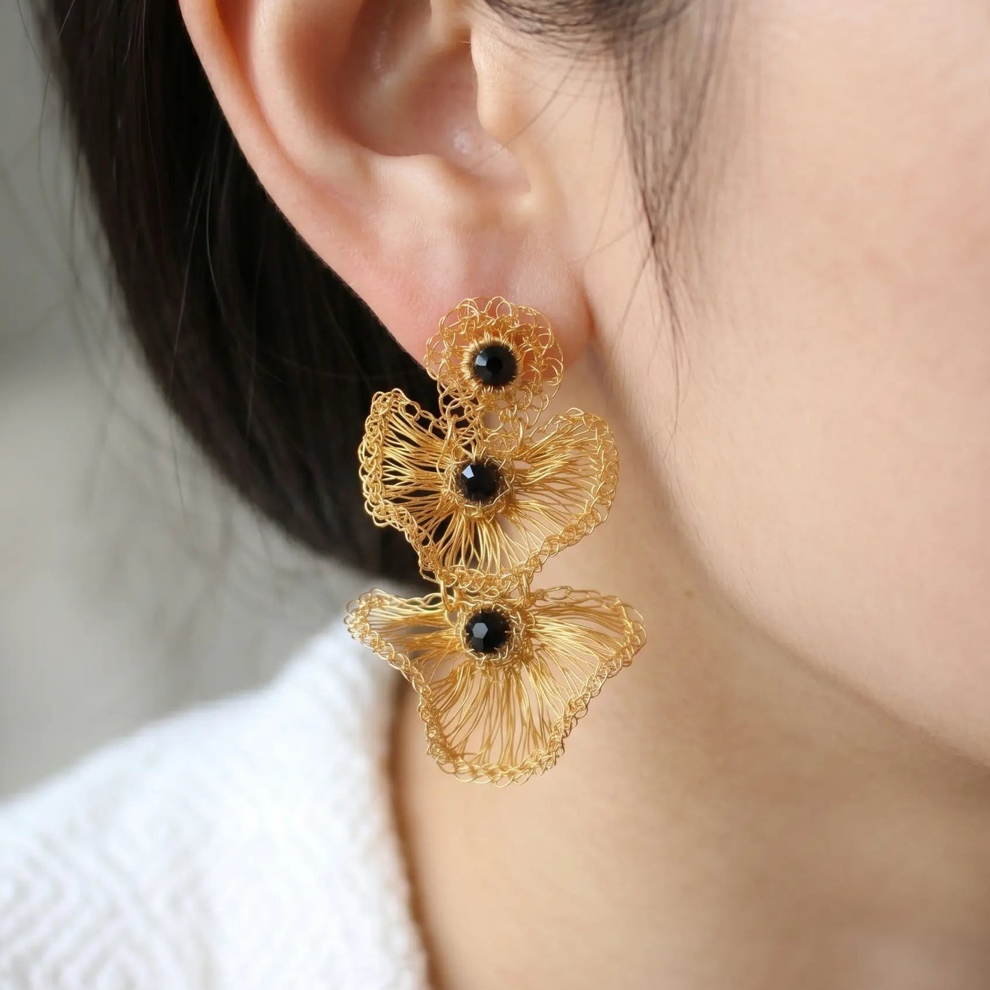 Handmade crochet wire gold earrings with black beads. Unique handmade earrings to elevate your outfits with luxury accessories, Handmade accessories for stylish women