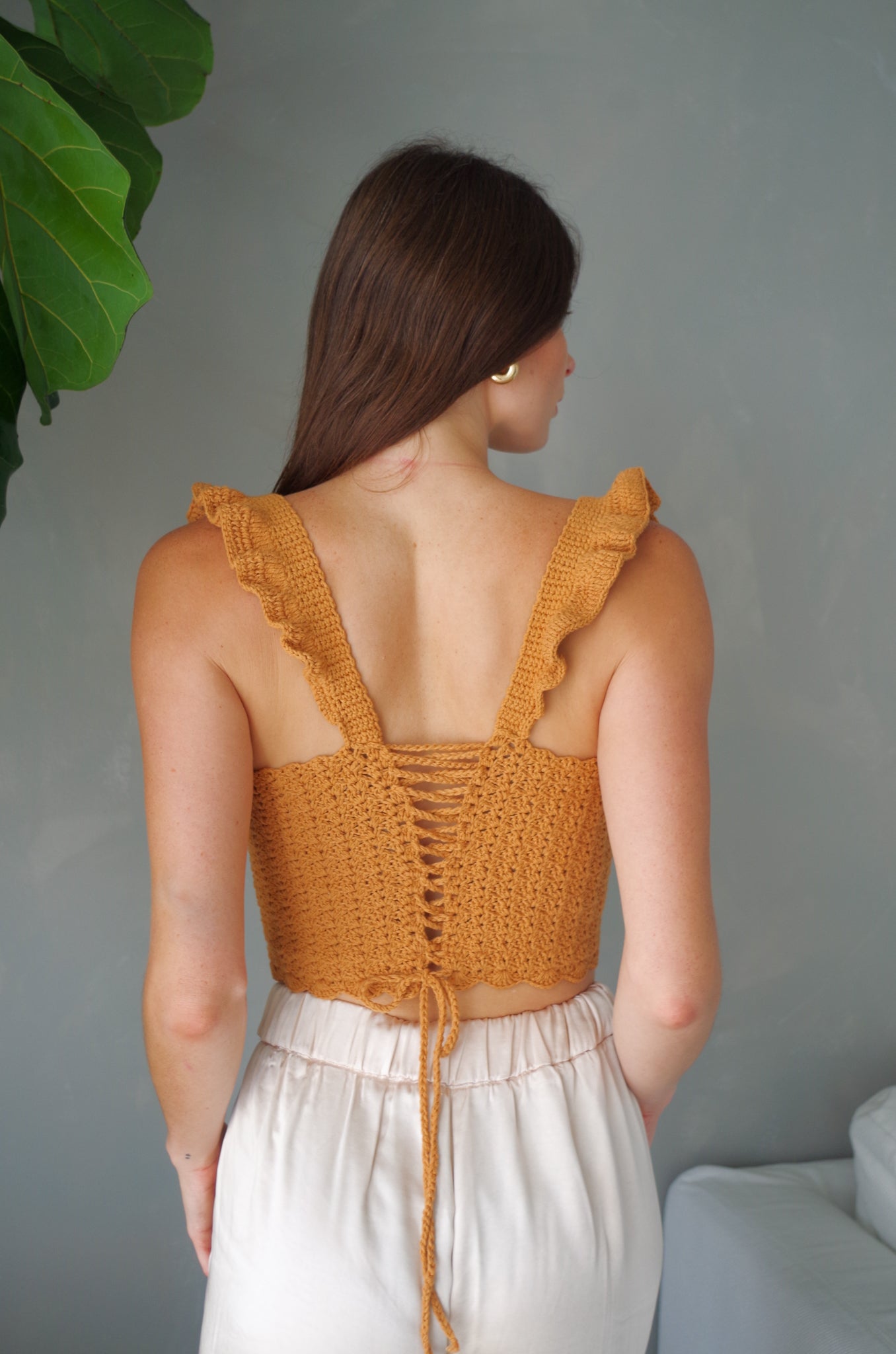 Handmade crochet corset top. 100% cotton with ruffled sleeves, square neckline.