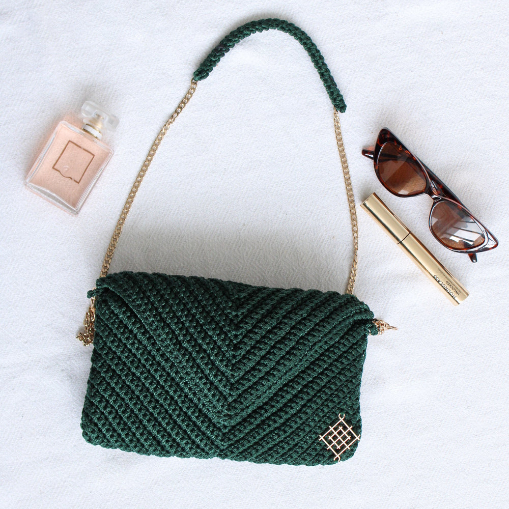 
                      
                        Handmade crochet envelope bag in dark green
                      
                    