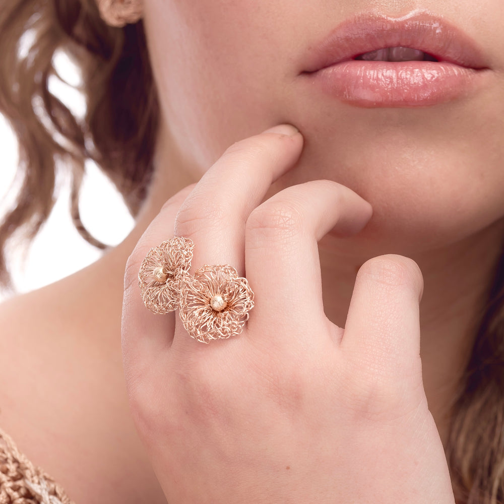 
                      
                        Flower shape handmade crochet ring. 18 Karat Gold Filled Wire made in brazil.
                      
                    