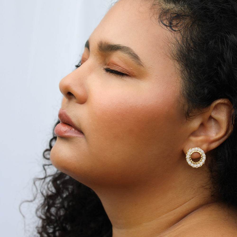 
                      
                        small circle crochet handmade earrings. 18 karat gold filled copper wire. Lightweight and delicate geometric earrings with white beads
                      
                    