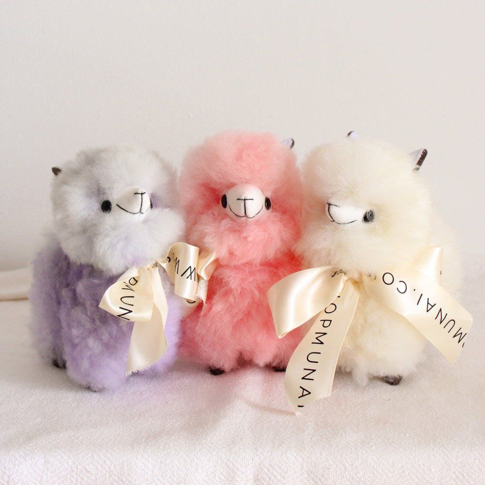 Home decor or gift soft beige llama plushies. 100% alpaca wool plushies. Made by Bolivian and Peruvian artisans. Chibi cute super fluffy pink llama toy