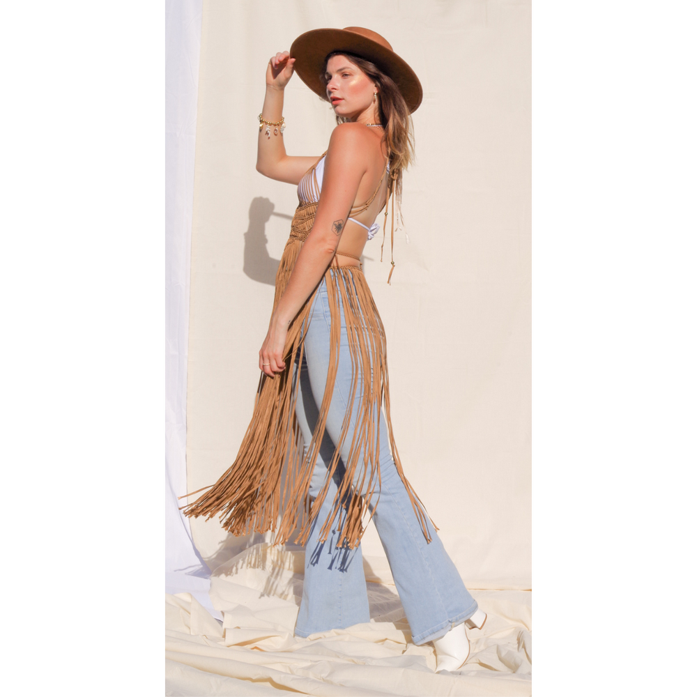 
                      
                        Luna caramel Macrame Dress (one size fits S - XL) Macrame beach cover up or fashion accessory. Halter Top and Wrap Dress closure. with fringe skirt Colors available: Beige, Gold, Caramel, Brown. Care instructions: Steam to straighten any wrinkles. Dry clean or gentle hand wash. 100% rayon. Ethically made by Bolivian artisans.
                      
                    