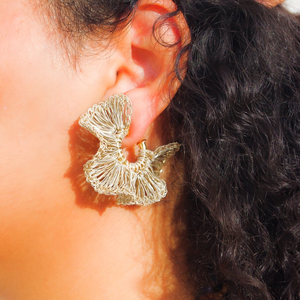 Lightweight ruffled crochet hoops, 18 karat gold filled copper wire and create a statement look without the weight or bulk!