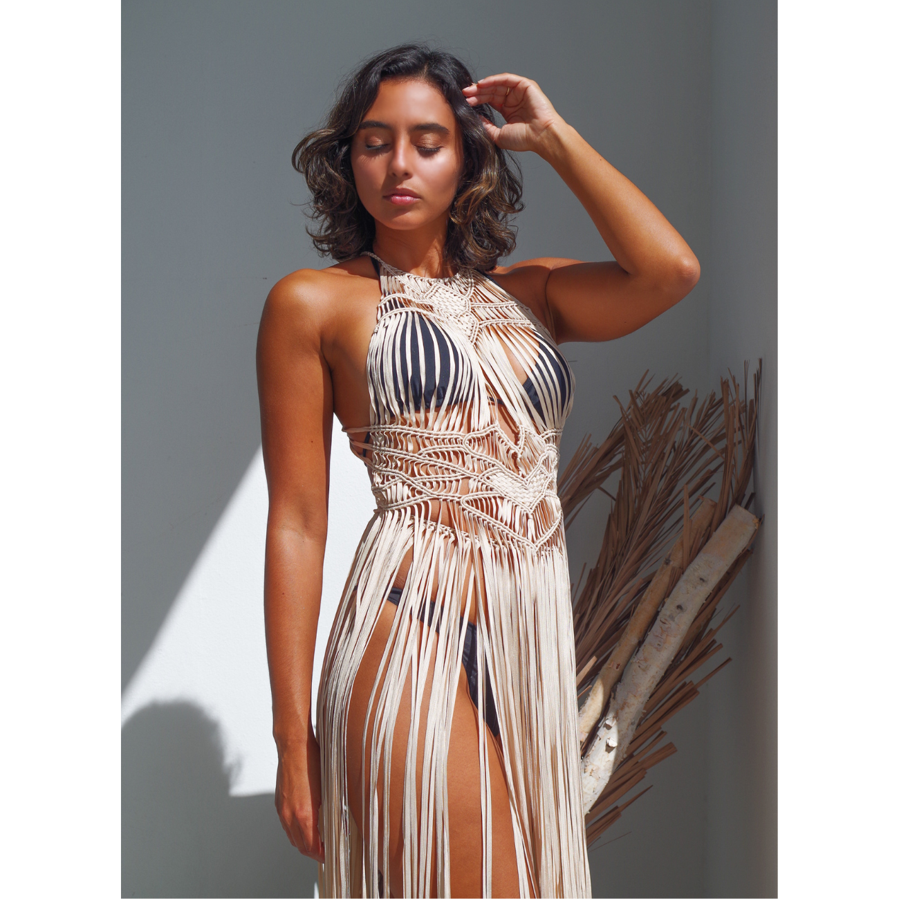 Luna Beige  Macrame Dress (one size fits S - XL) Macrame beach cover up or fashion accessory. Halter Top and Wrap Dress closure. with fringe skirt Colors available: Beige, Gold, Caramel, Brown. Care instructions: Steam to straighten any wrinkles. Dry clean or gentle hand wash. 100% rayon. Ethically made by Bolivian artisans.