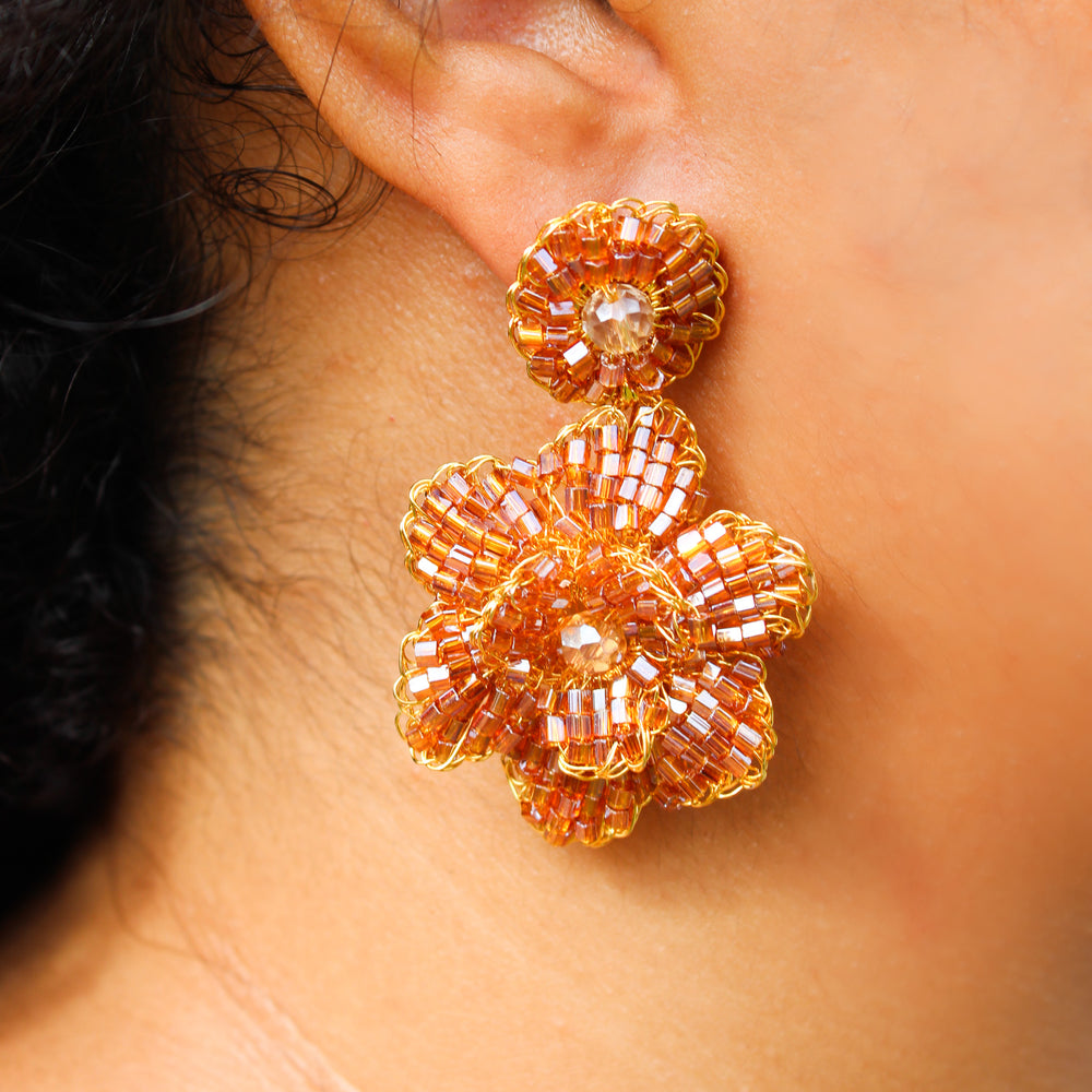 
                      
                        Mauve Flower Earrings
                      
                    