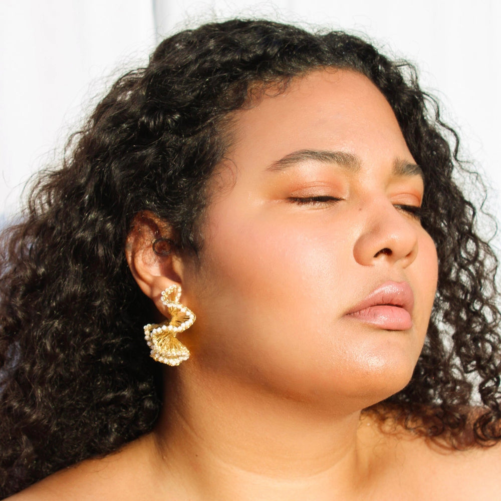 
                      
                        unique Lightweight ruffled crochet hoops, Black beads and 18 karat gold filled copper wire and create a statement look without the weight or bulk!
                      
                    