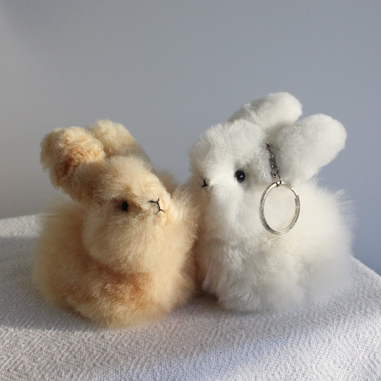 Cute fluffy Bunny keychains in beige and white - Bag charms or leychains. Alpaca fur Bunny plushies
