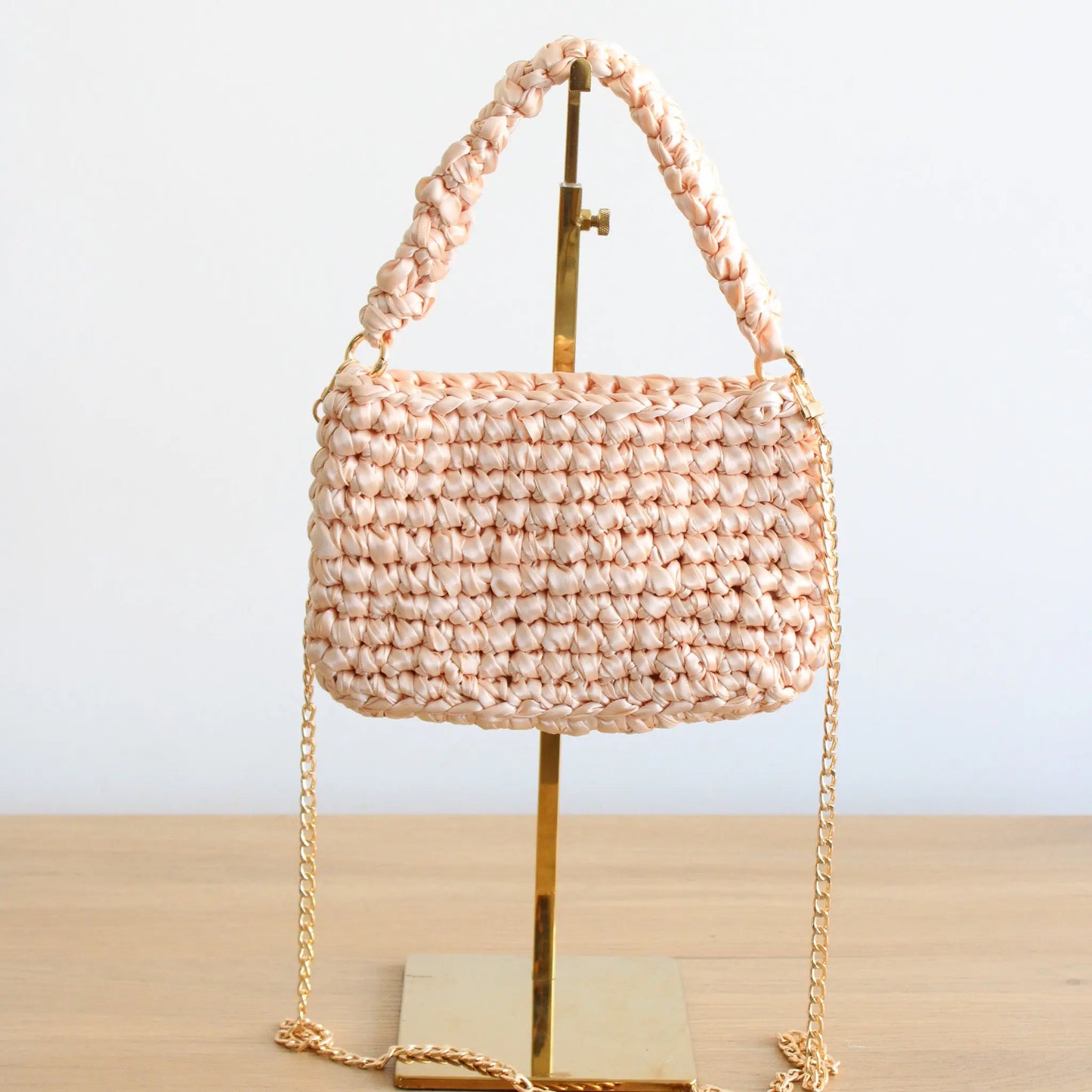 Handmade Stella crochet bag. Stylish crochet bah with top handle. Includes long gold chain strap for crossbody looks. Luxury bag fully lined.