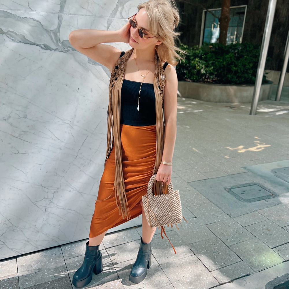 
                      
                        Caramel Marina Skirt, top or Belt Boho Beach Cover Up with tassels. Weaving width: 6" in Fringe length: 26" in approx. Tie Closure. Handmade in Bolivia. Handwash only. One size fits all 
                      
                    