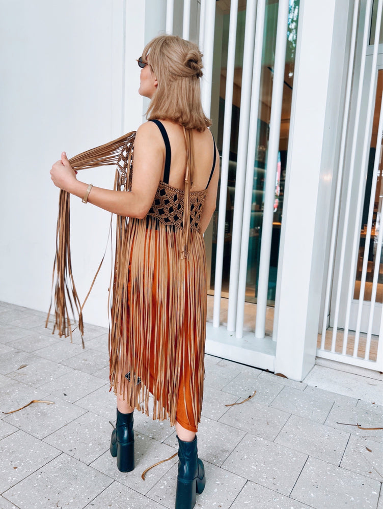 Marina Skirt or Belt Beach Cover Up with tassels. Weaving width: 6" in Fringe length: 26" in approx. Tie Closure. Handmade in Bolivia. Handwash only