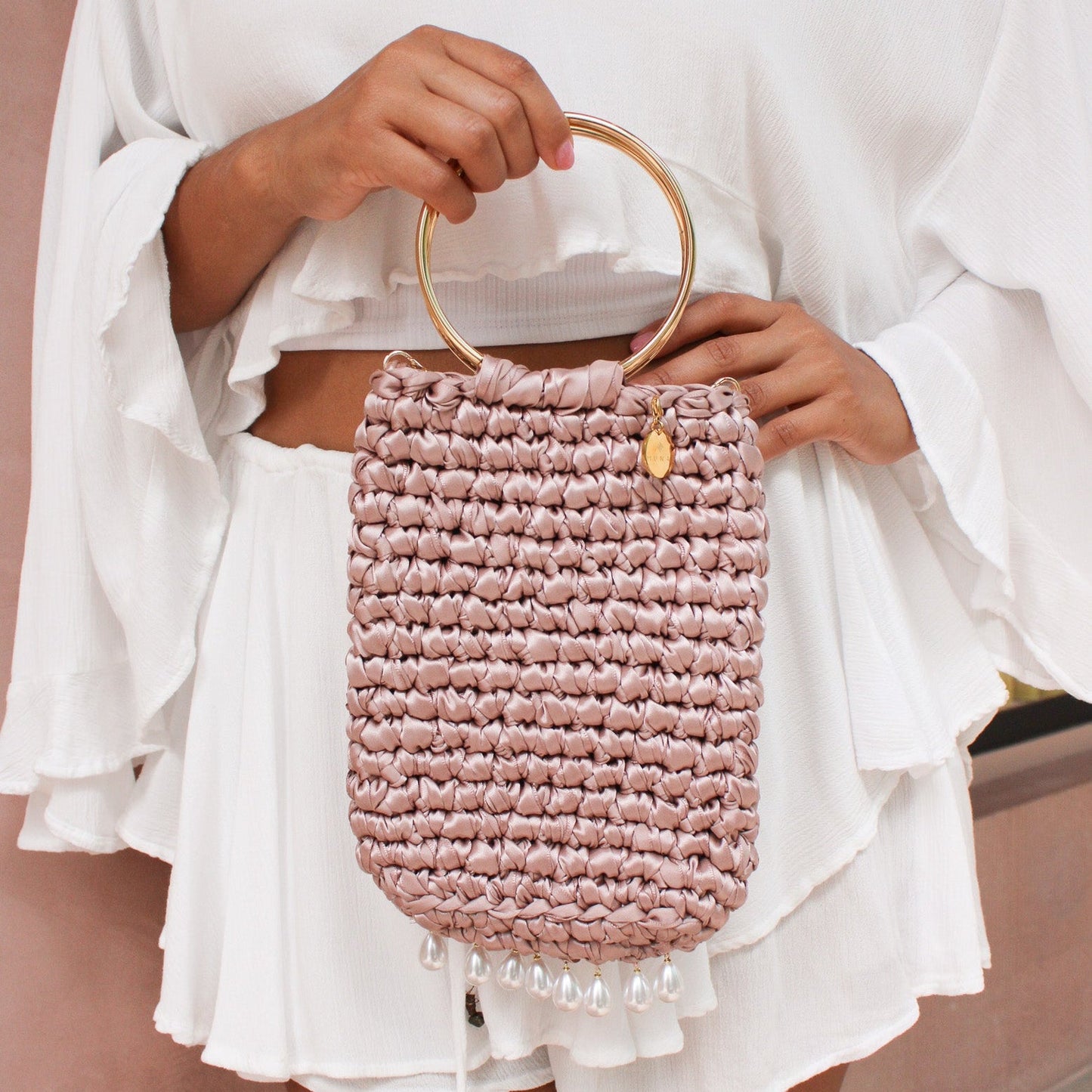 Molly Crochet bag dusty pink color - lifestyle image - Munai