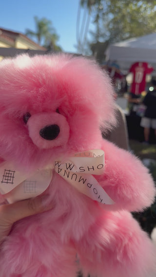 Authentic alpaca fur fluffy teddy bear light pink plushie with white bow. Light pink teddy bear plushie
