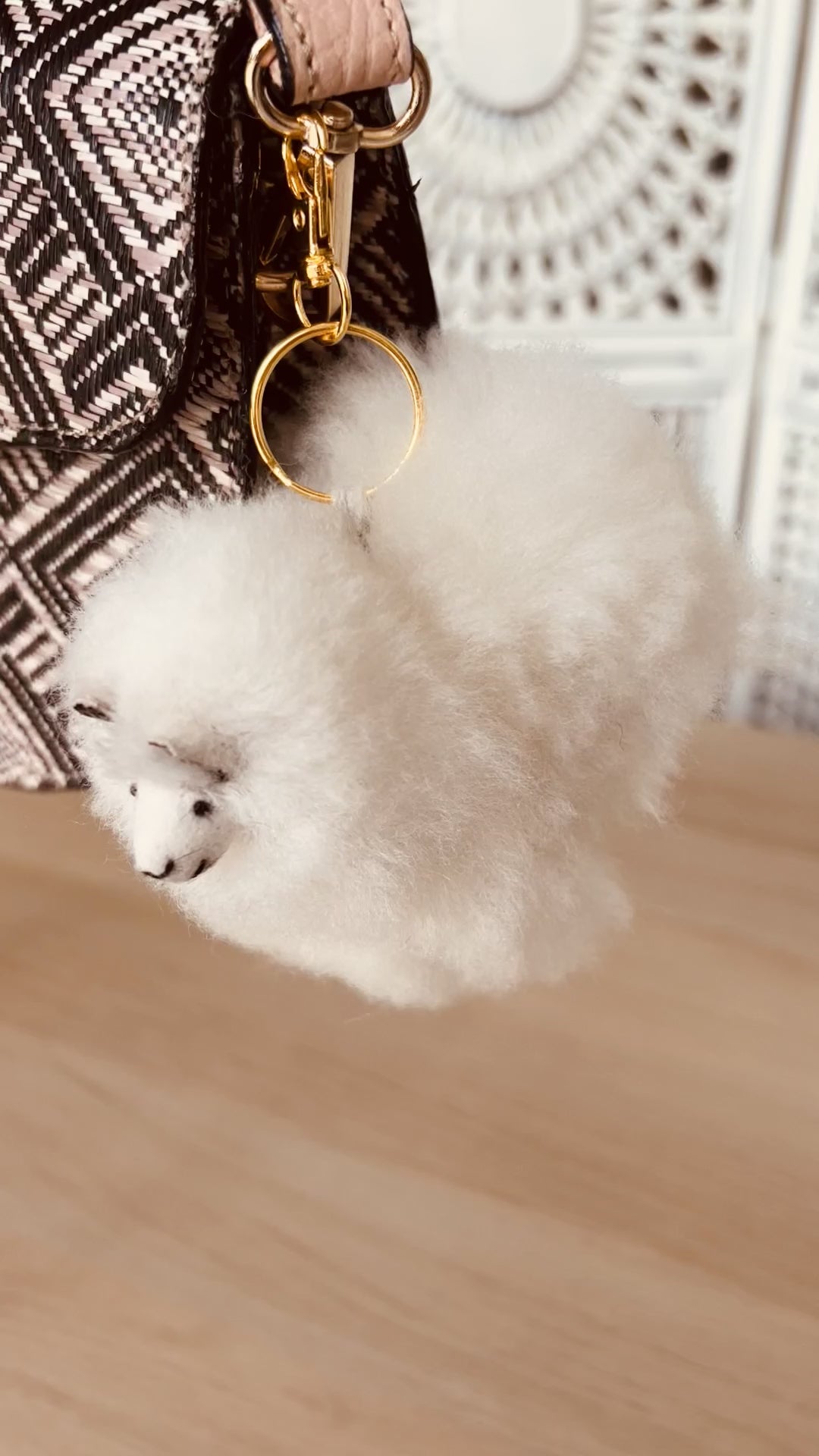 Llama plushie pom pom keychain. Pom Pom size 3” in approx. Made with 100% alpaca wool. Made by Bolivian and Peruvian artisans. Colors Available: pink, white, beige, purple. Adult or children gift 