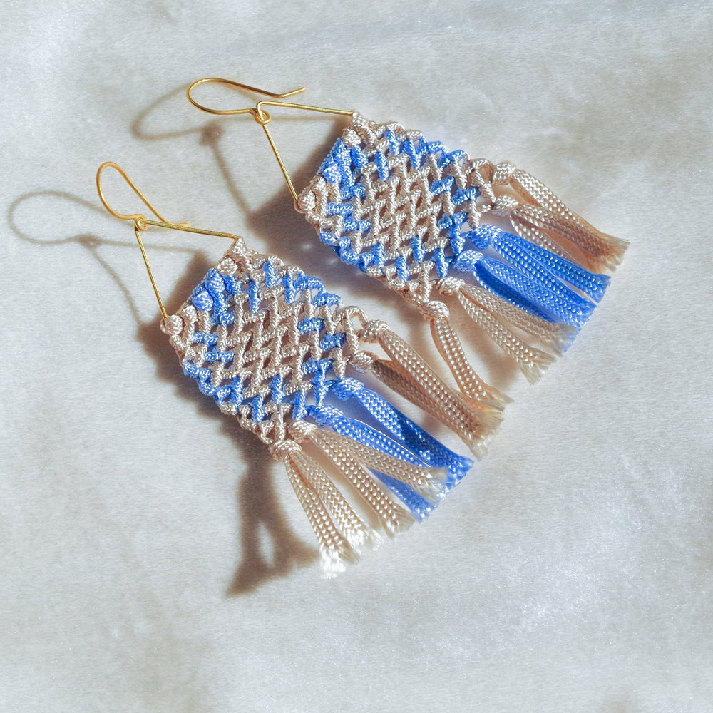 
                      
                        Macrame earrings with fringe. Gold plated hook earrings won’t cause any allergies nor rust with time. Beige and baby blue handmade macrame earrings
                      
                    