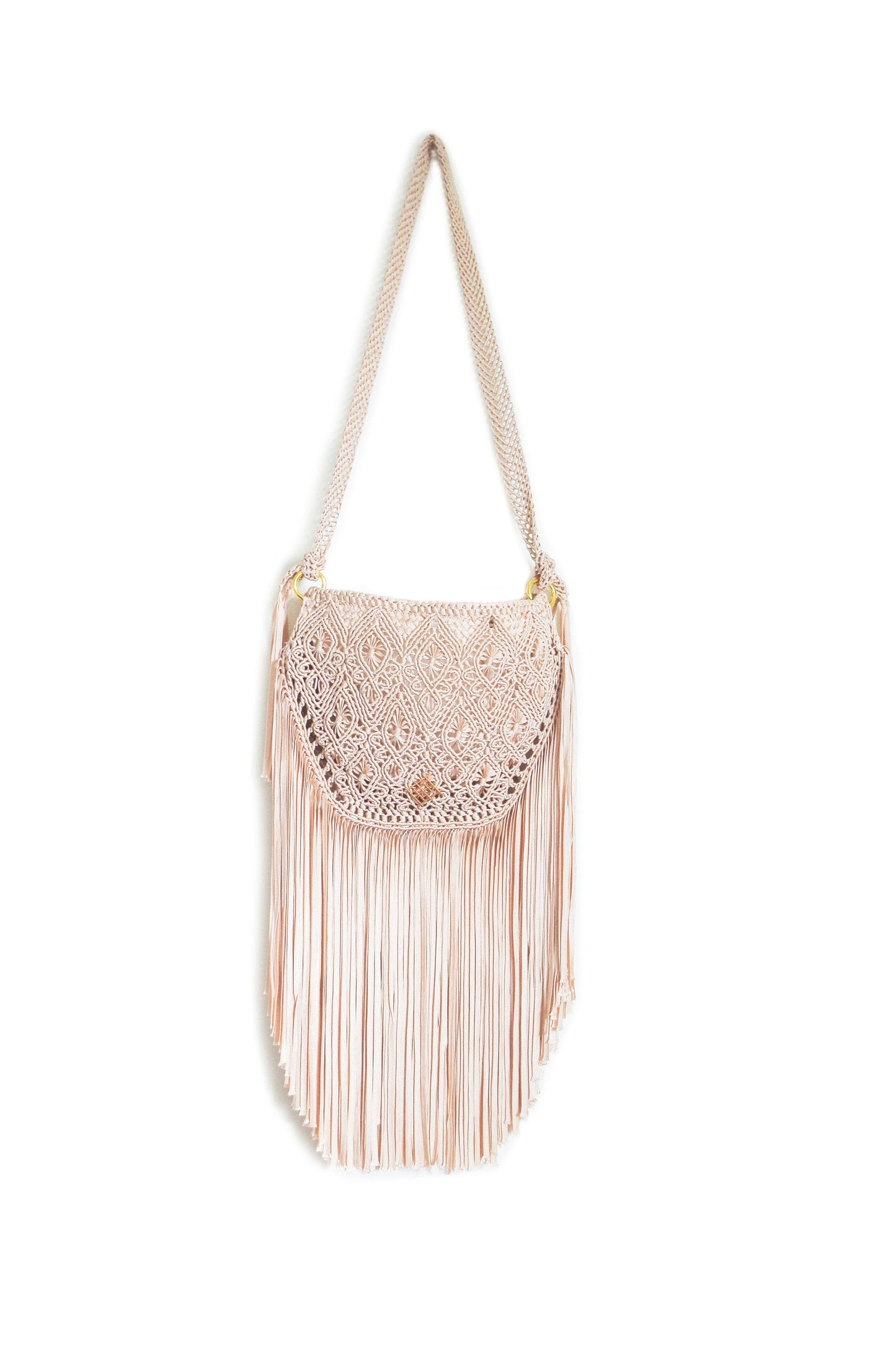 Beige Macrame crossbody bag with fringes. Includes lining and zipper. Handmade in Bolivia. Hand Wash and professional cleaning only. 100% Rayon