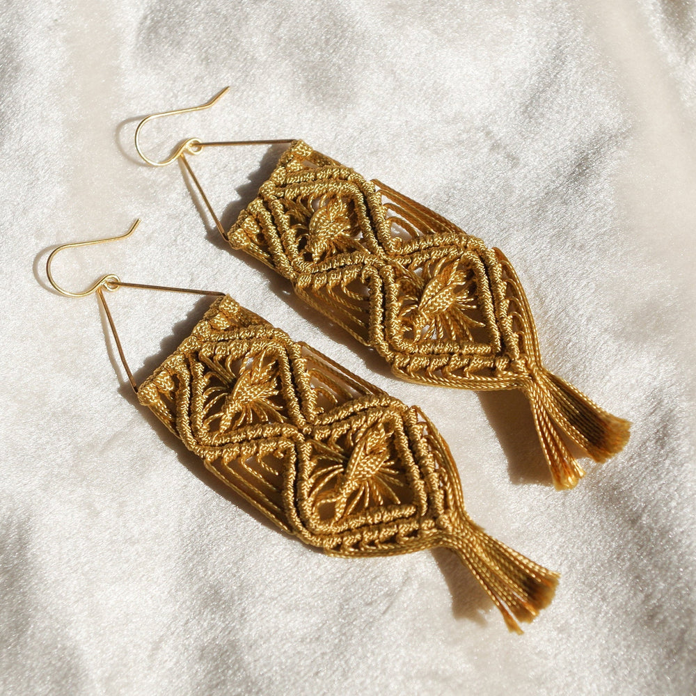 
                      
                        Macrame flower pattern earrings. Gold plated hook earrings won’t cause any allergies nor rust with time. Handmade colorful macrame long earrings
                      
                    