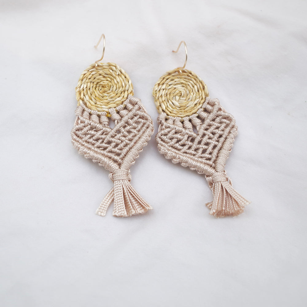 
                      
                        Totora Earrings
                      
                    