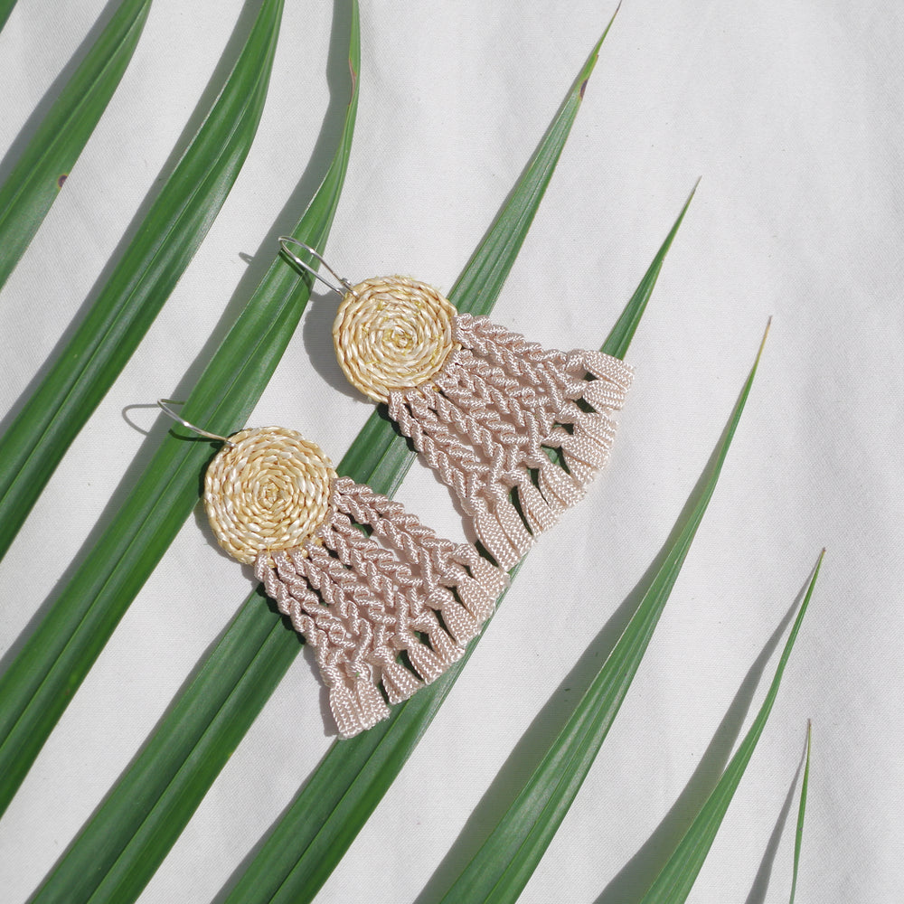 
                      
                        Totora Earrings
                      
                    