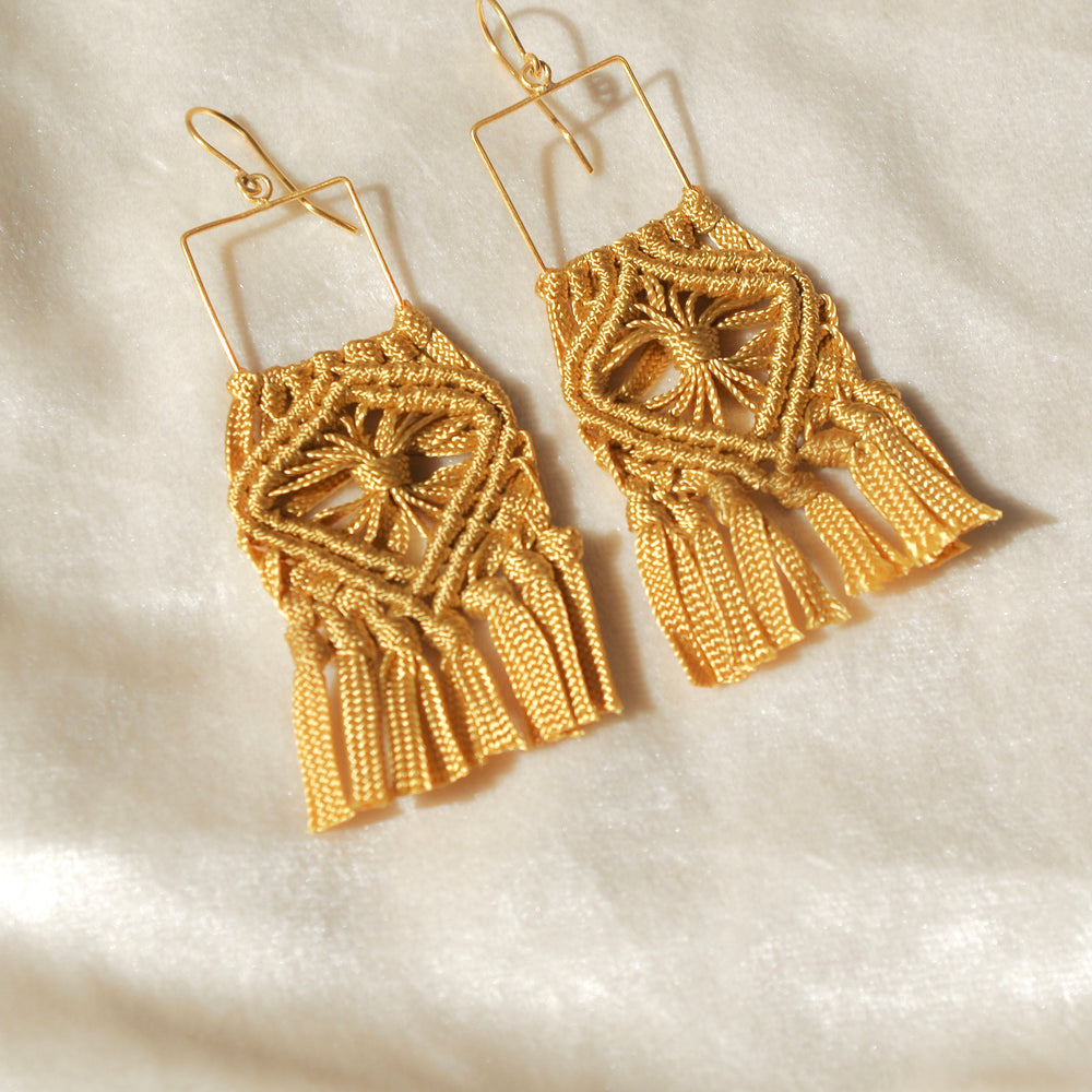 
                      
                        Macrame flower pattern earrings. Gold plated hook earrings won’t cause any allergies nor rust with time. Handmade colorful macrame long earrings
                      
                    