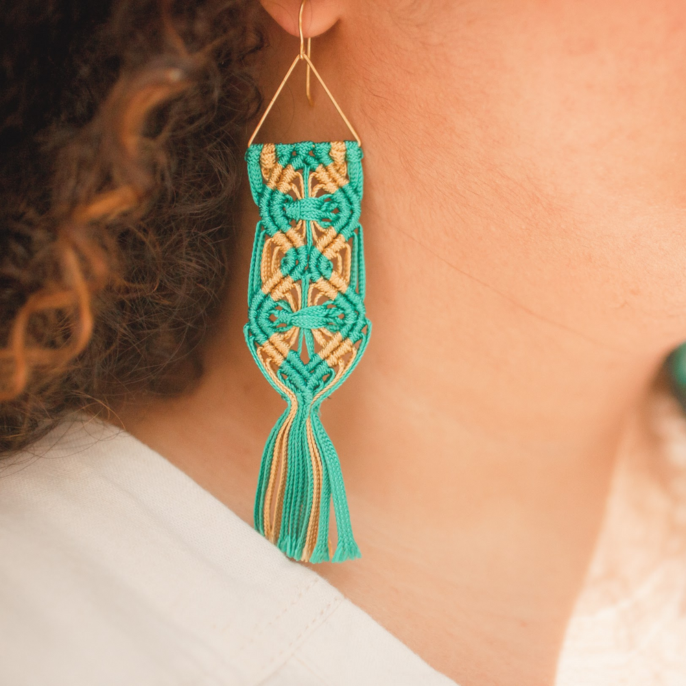 
                      
                        Macrame flower pattern earrings. Gold plated hook earrings won’t cause any allergies nor rust with time. Handmade colorful teal macrame long earrings
                      
                    